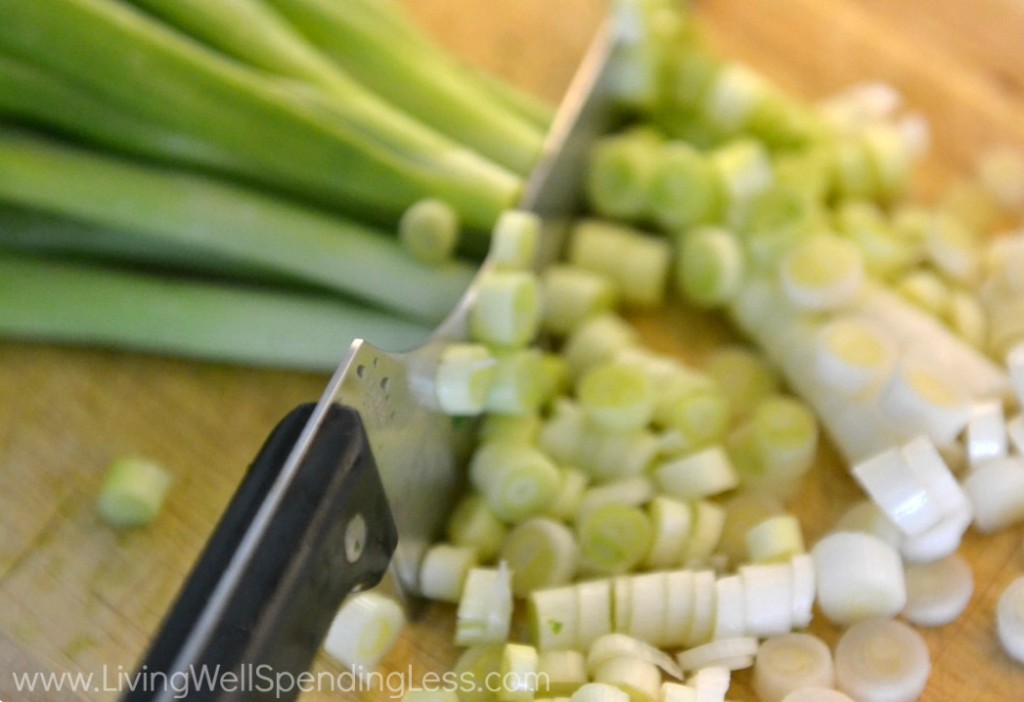 Chop green onions and mince garlic; set aside.