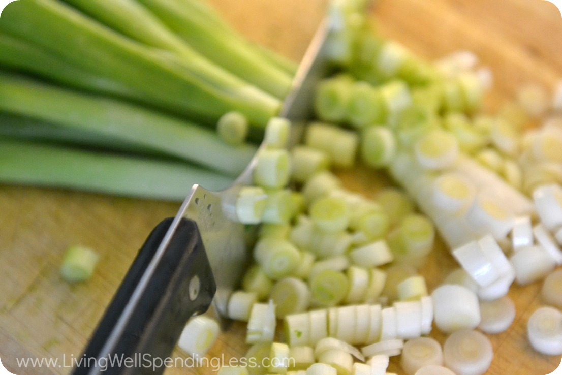 Chop green onions and set aside