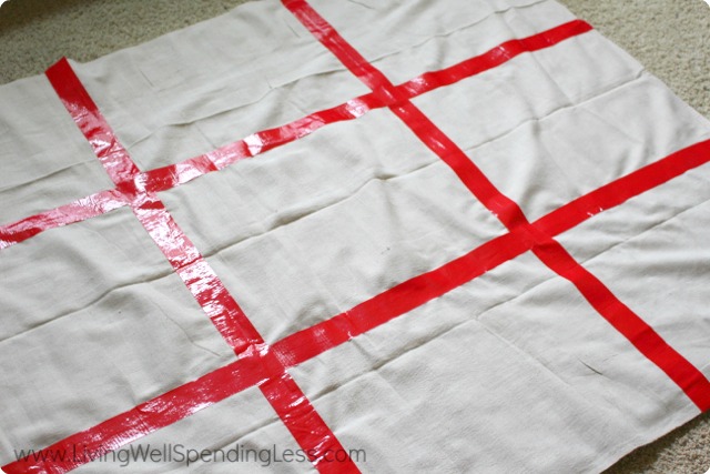 The finished taped cloth should have nine total squares. 