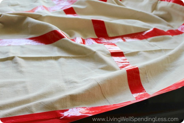 Taping around the edge of the cloth reinforces the game board and makes a nice border!