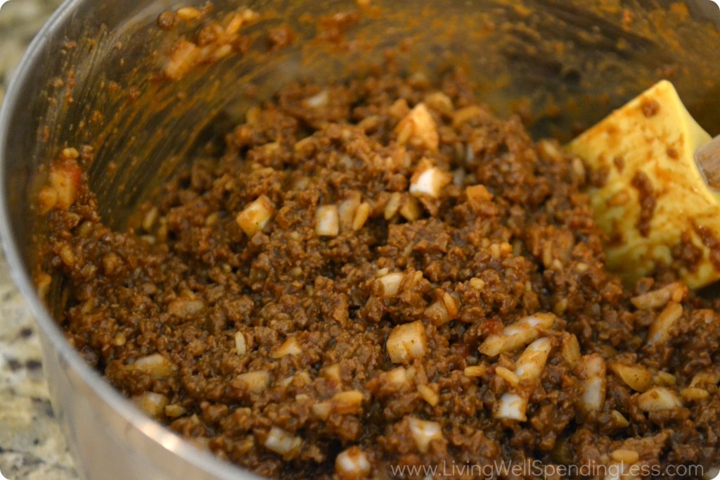 Add ground beef to sauce mixture and mix until fully incorporated. 