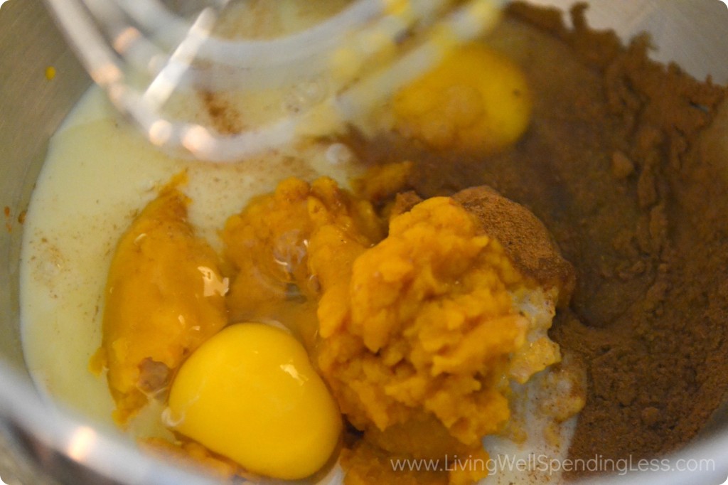 Combine the milk, egg, pumpkin and spices and whisk together in your mixer.