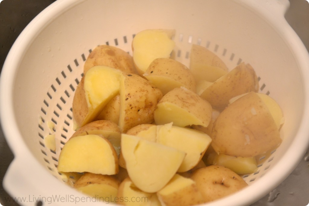 Drain cooked potatoes in a colander. 