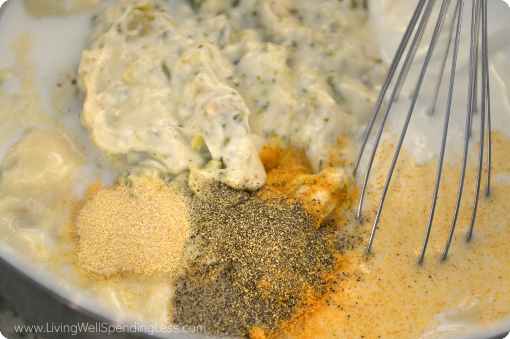 Whisk together the soup, seasonings and milk for the base of your creamy broccoli casserole. 