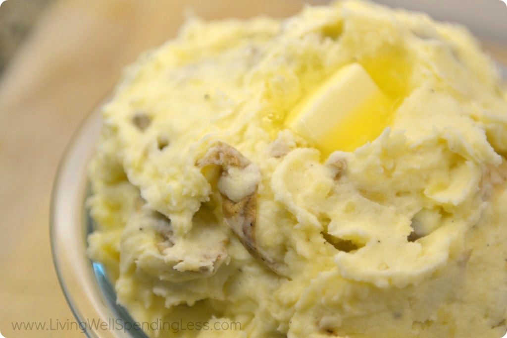 Serve mashed potatoes in a bowl topped with butter. 