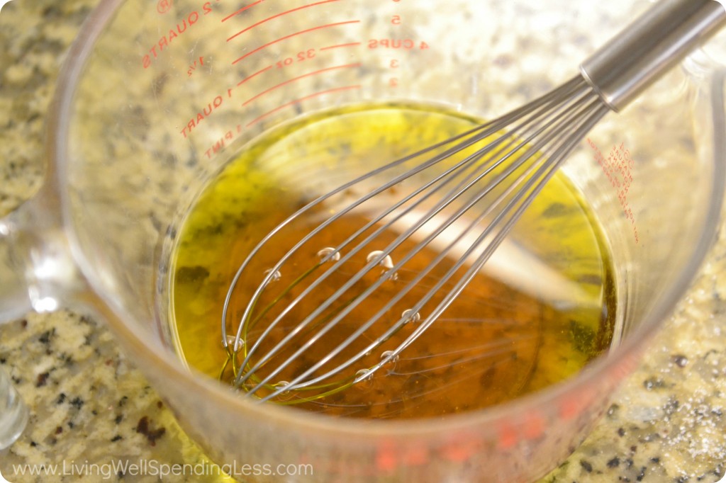 Whisk together the honey and olive oil as you make your DIY salt scrub.