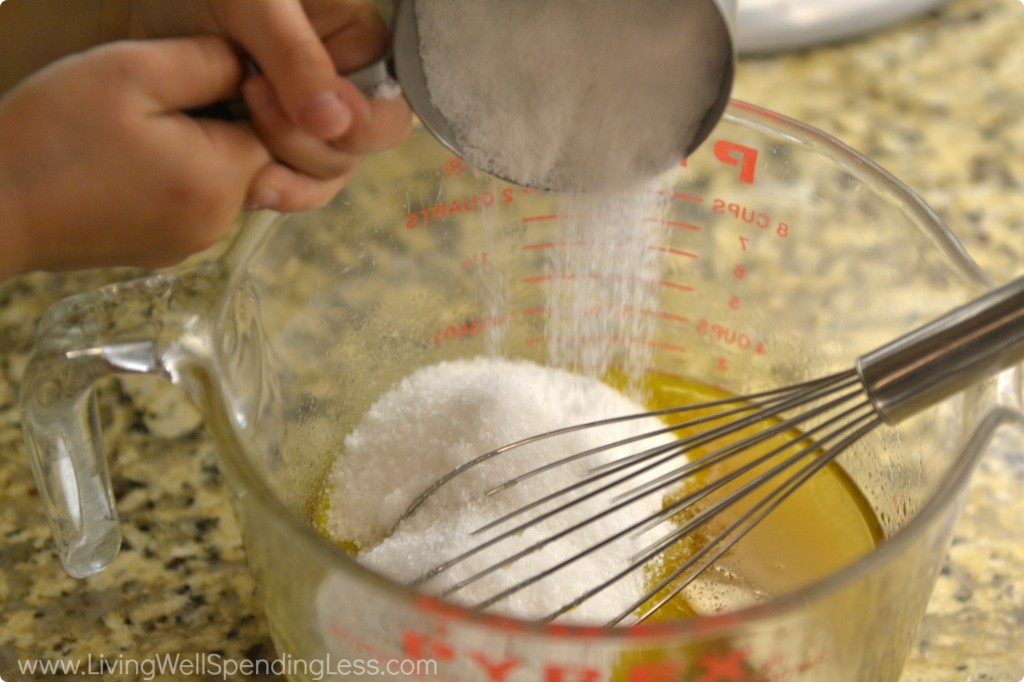 Slowly whisk in the salt to the scrub mixture. 