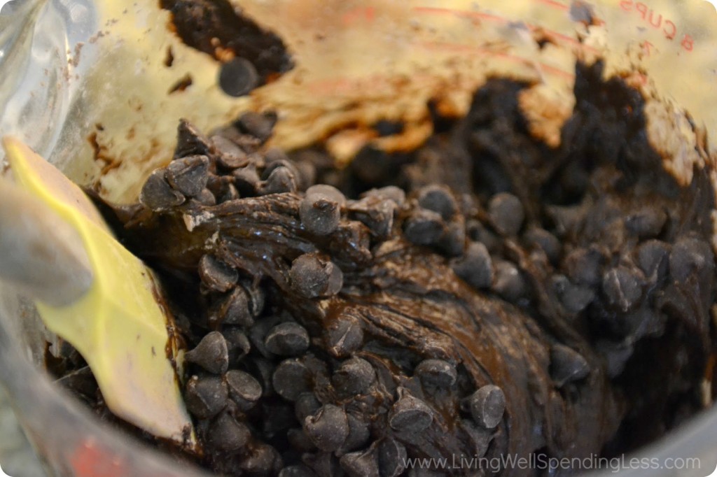 Fold in the chocolate chips to the chocolate cookie batter using a rubber spatula. 