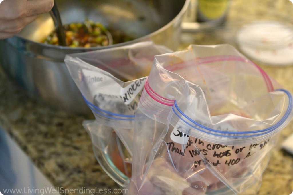 Divide chicken into two gallon labeled freezer bags. 