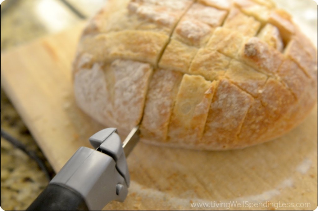 Cross slice the load of bread but don't cut all the way through to the bottom