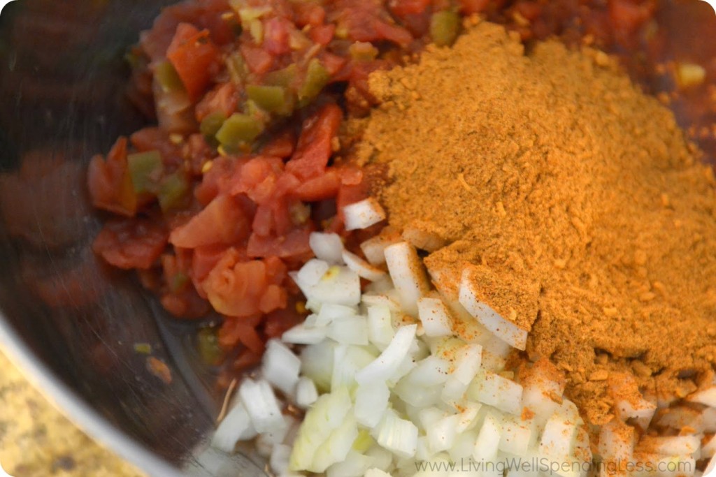 Mix together tomatoes, taco seasoning and onion. 