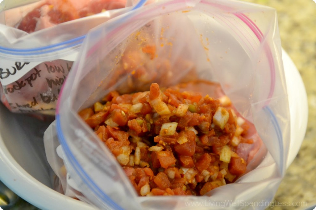 Divide beef into 2 gallon size freezer bags with tomato mixture. 