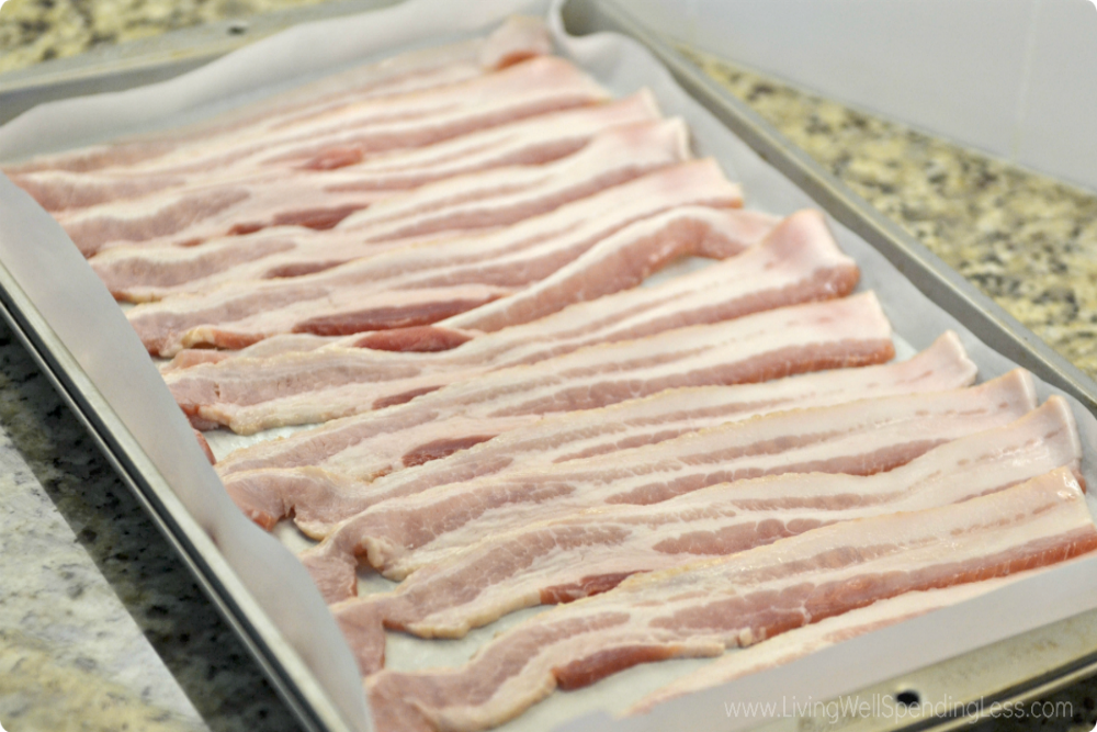 Lay the bacon flat on your parchment lined baking pan. 