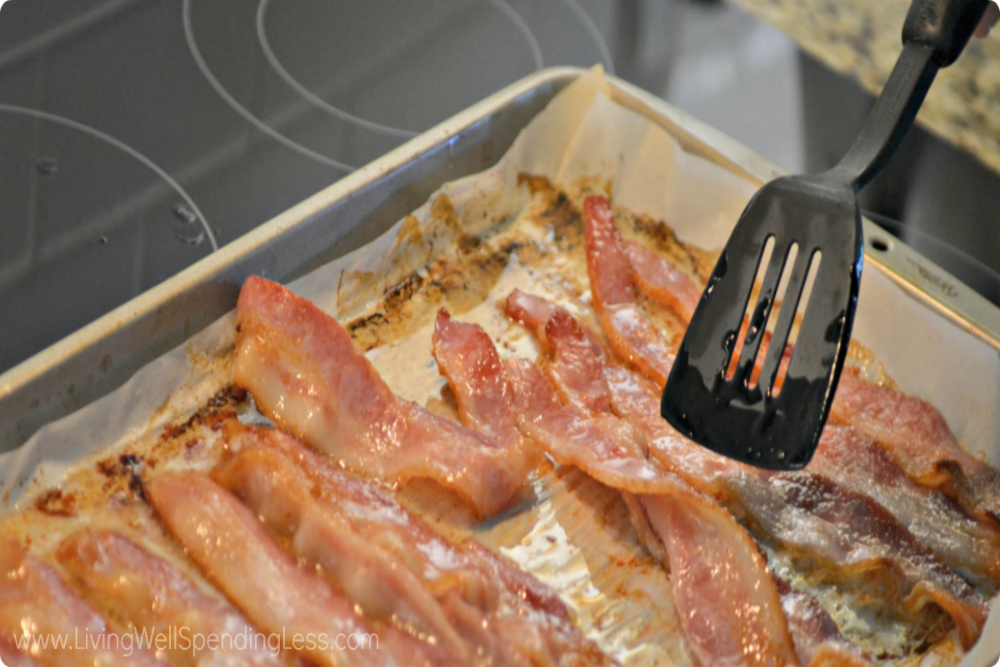 Bake the bacon for ten minutes and then use a spatula to flip each strip. 