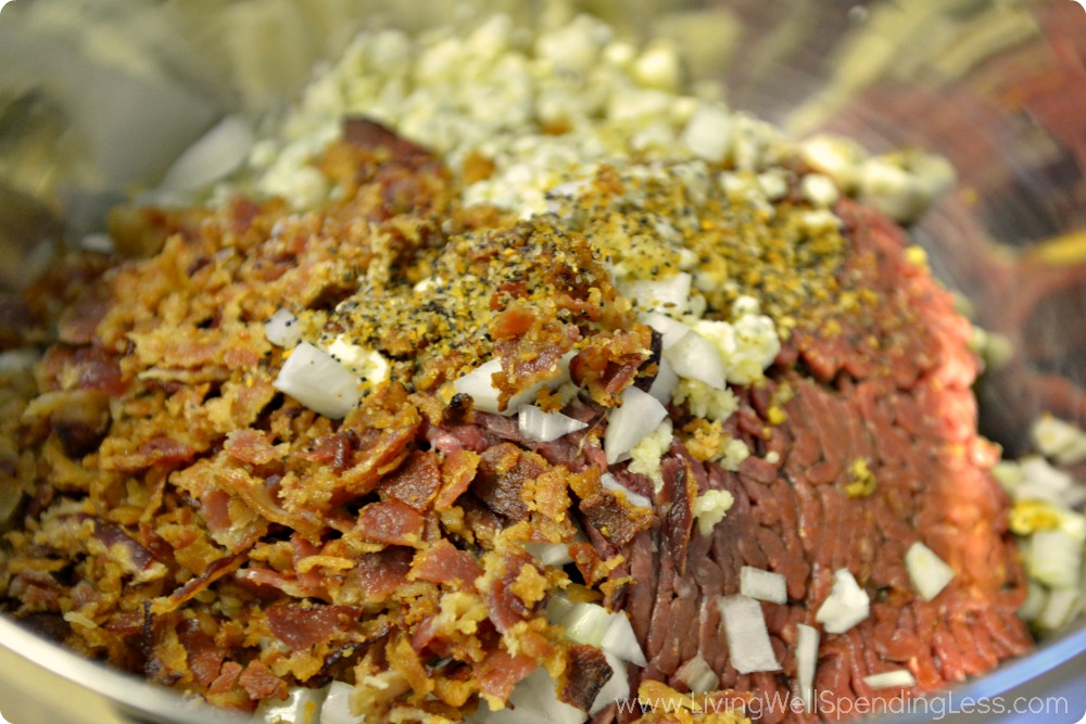 In a large bowl, mix all ingredients together with ground beef until well incorporated. 