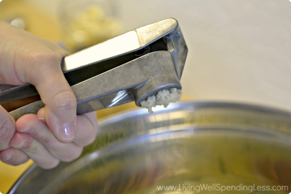 Use a garlic press to mince the garlic for this easy Greek chicken recipe.