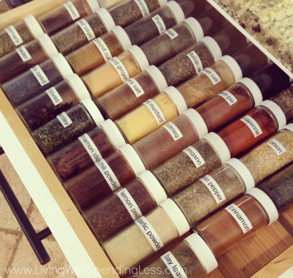 Uniformly labeled spices look beautiful in an organized DIY spice drawer. 