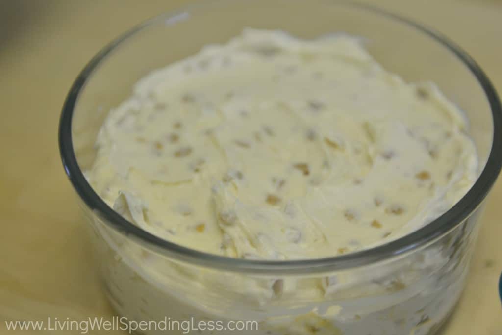 Once the dip is mixed together add the toffee chips into the bowl.