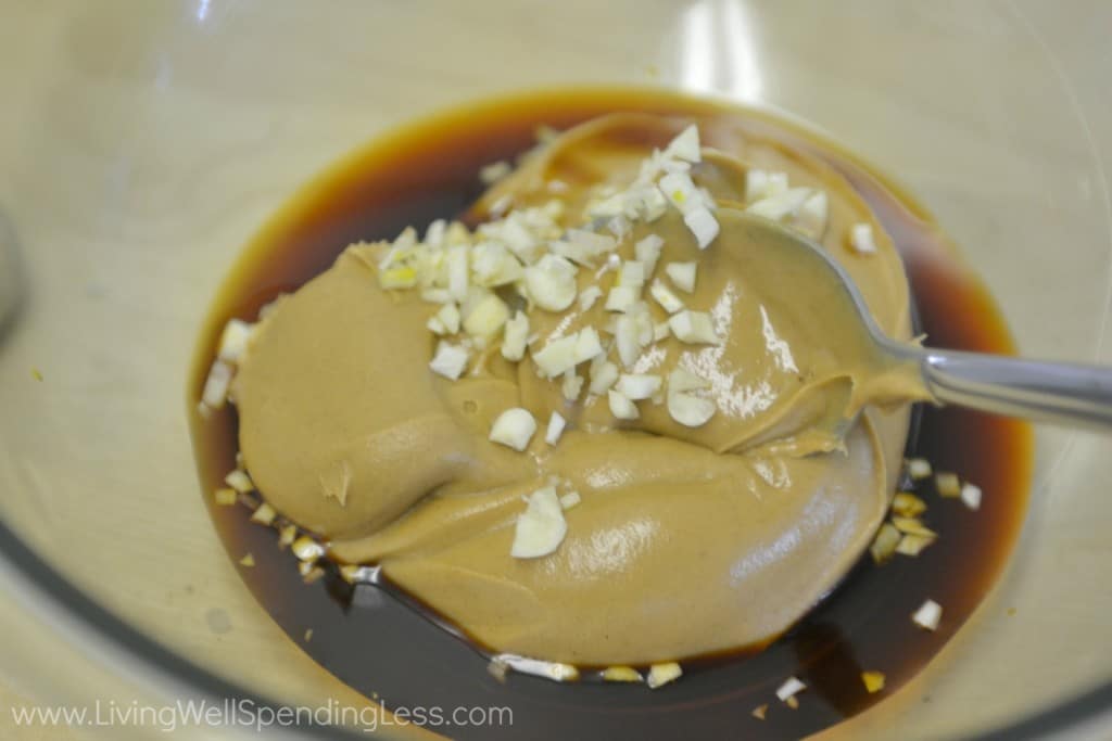 make the peanut butter sauce with chopped garlic and soy sauce.