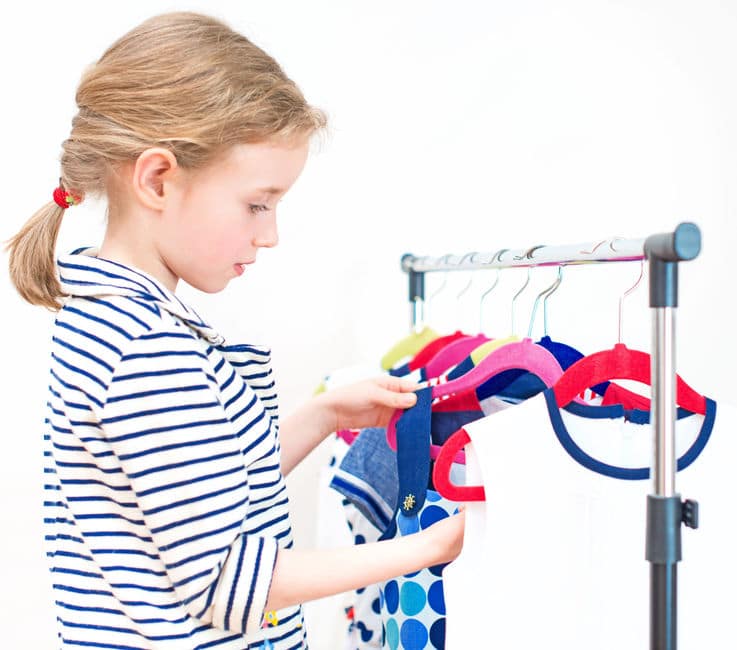 girl looking at clothes