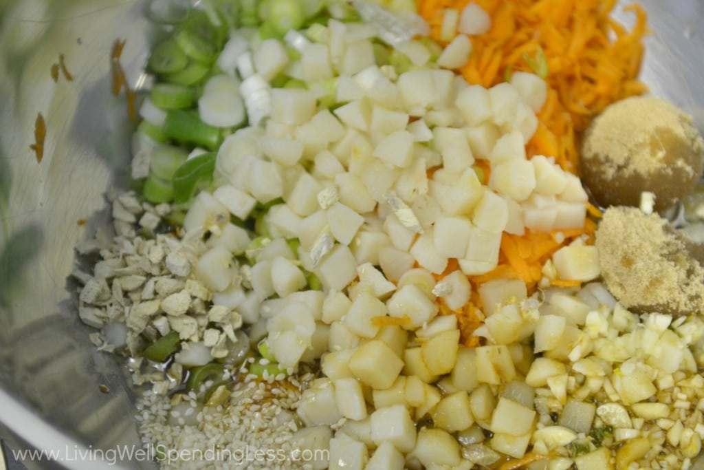 Mix together the seasonings, diced onions, chestnuts and carrot in a bowl. 
