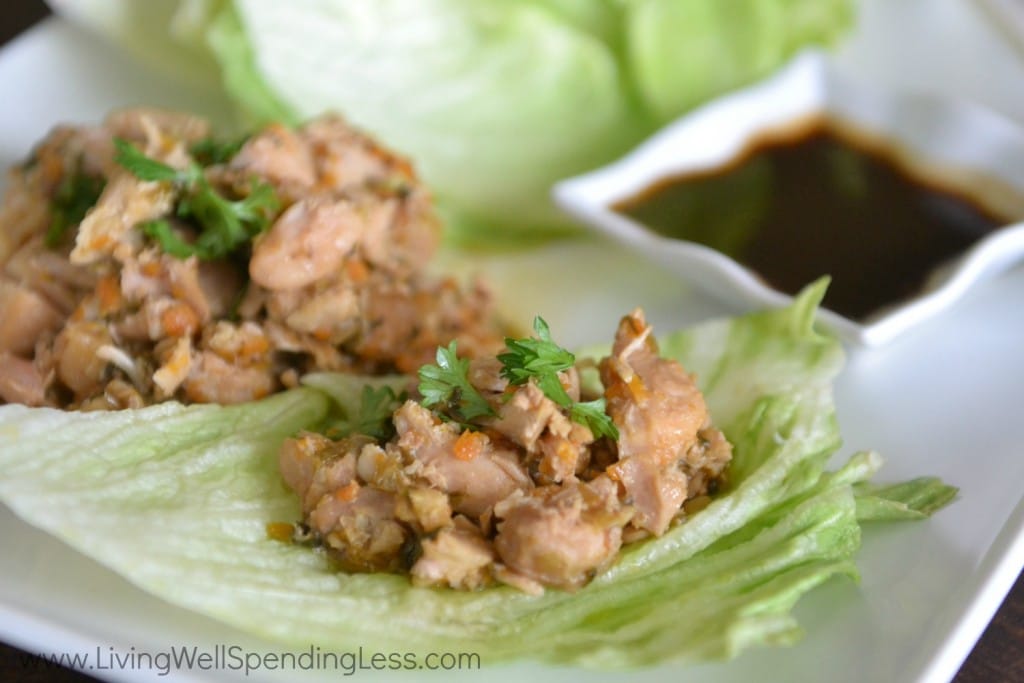 Serve the delicious chicken mixture in washed and dried lettuce leaves with a side of dipping sauce. 