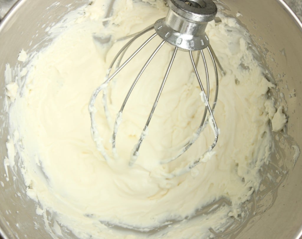Combine marscapone cheese and heavy cream in a mixer for the topping. 