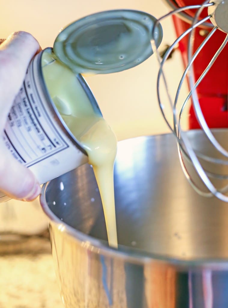 Add the sweetened condensed milk into the whipped cream