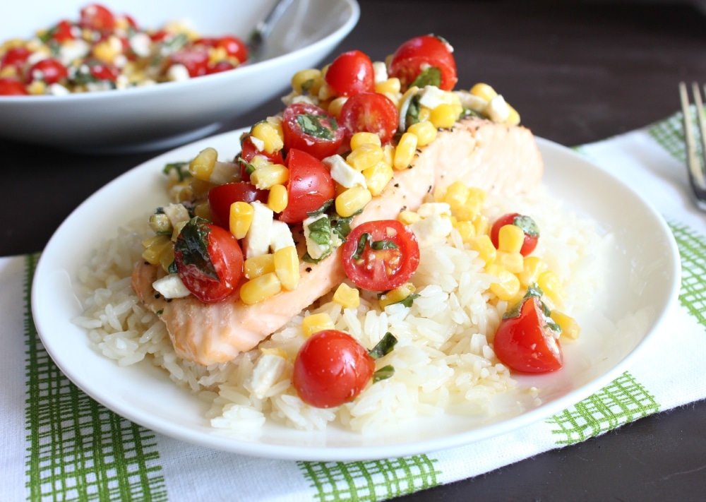 Enjoy roasted salmon, veggie salad, and rice together.