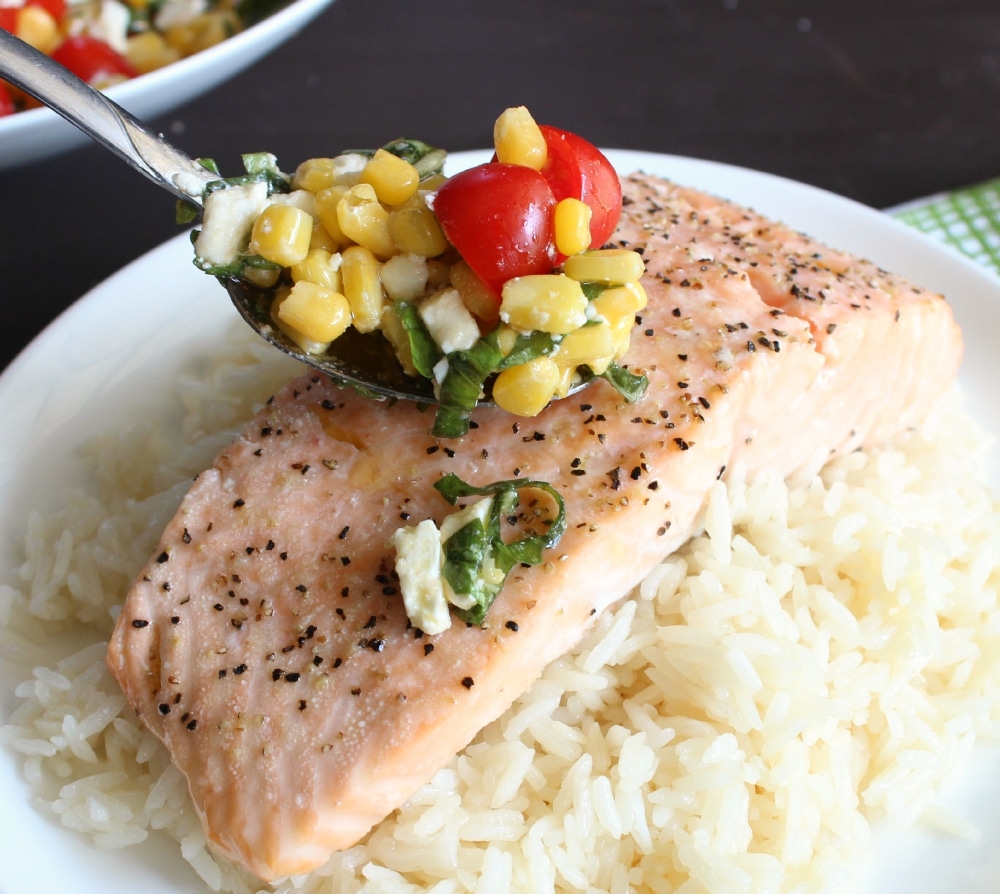 Spook corn mixture over salmon and rice.