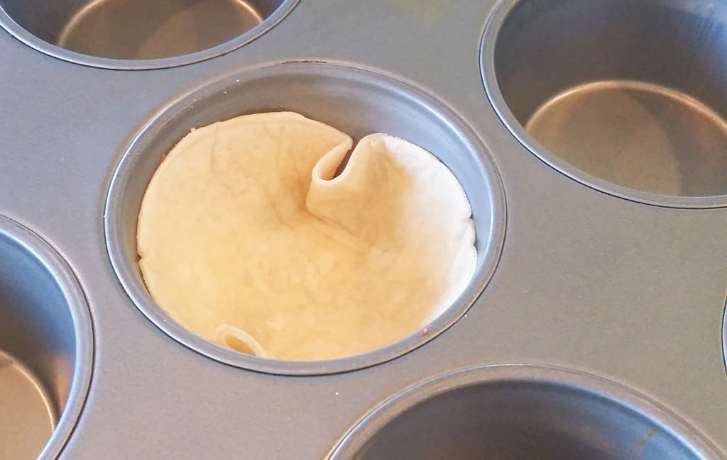 Place the mini tortillas at the bottom of a muffin pan to create easy taco cups!