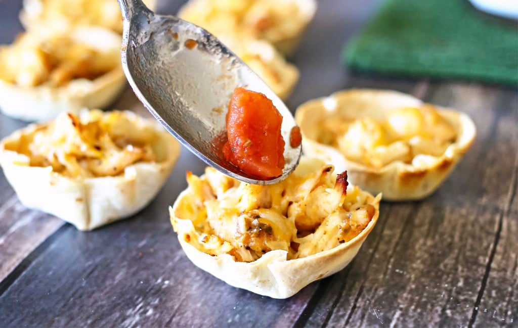 Top the easy taco cups with yummy tomatoes!