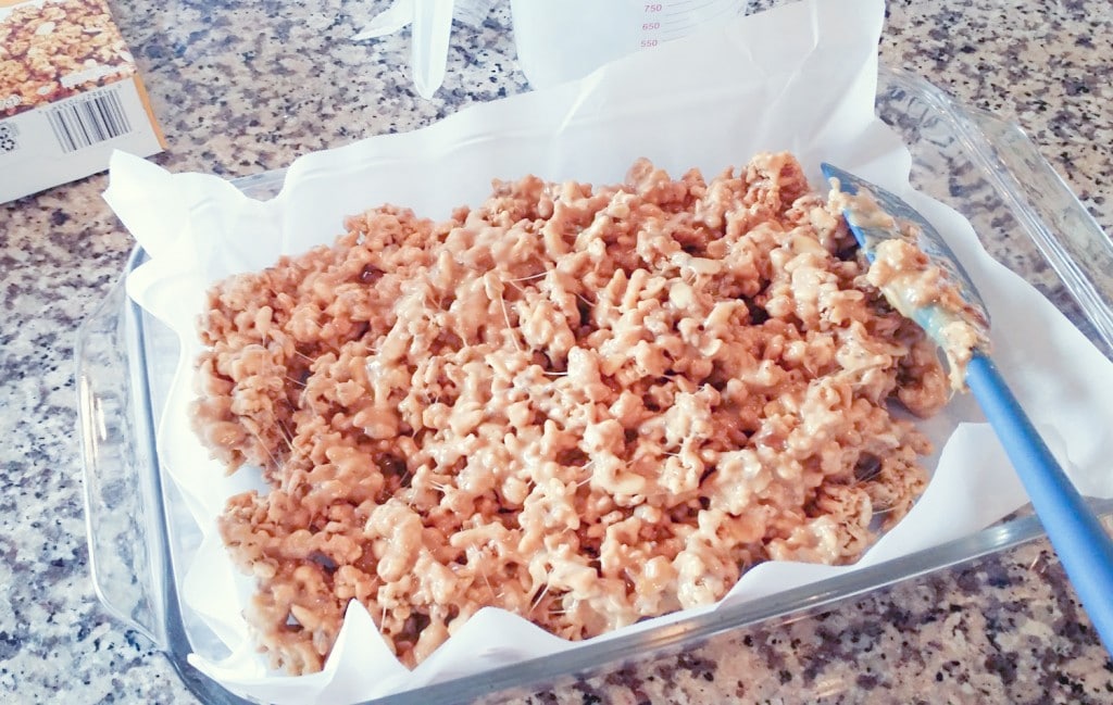 Spread cereal bar mixture in a lined dish