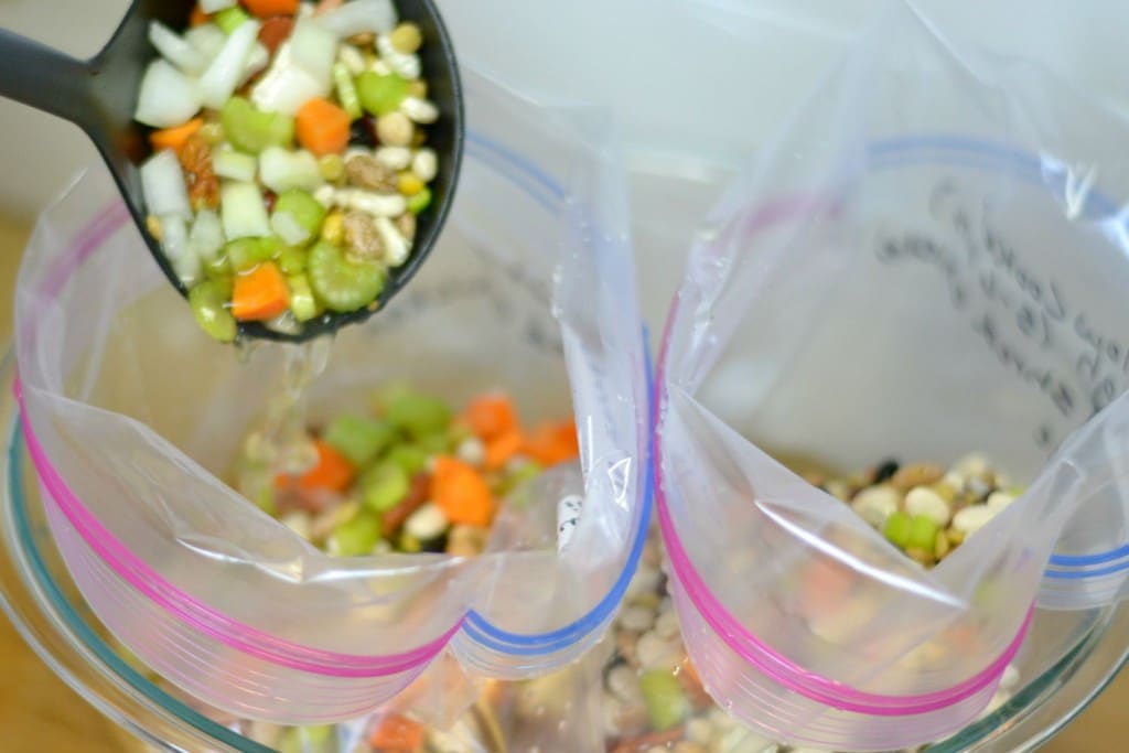 Diving soup into two gallon sized bags to be frozen until cooking day