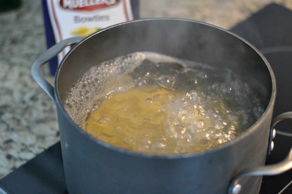 Boil the water first, then add in your pasta for this yummy browned butter pasta with peas. 