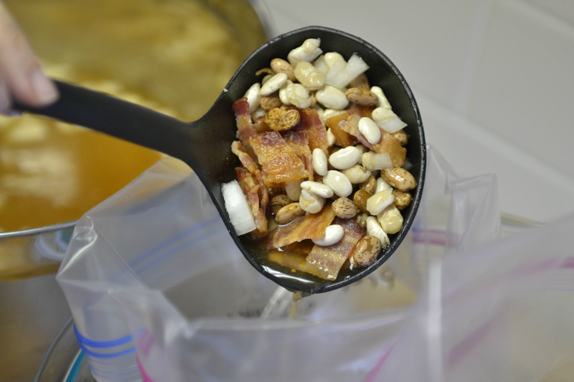 Divide the slow cooker bacon and beans and place in 2 freezer bags.
