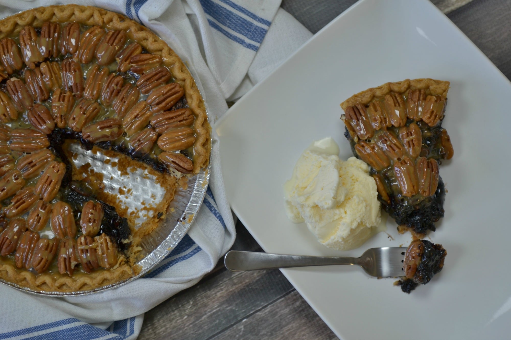 This salted caramel pecan pie is the perfect holiday pie. Serve with ice cream for a sweet treat.