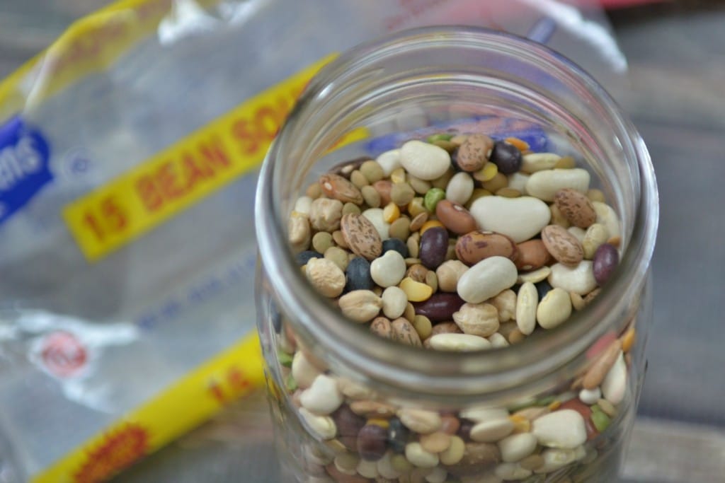 Fill the mason jar with the 15 bean soup mix, which you can buy already premixed at the grocery store. 