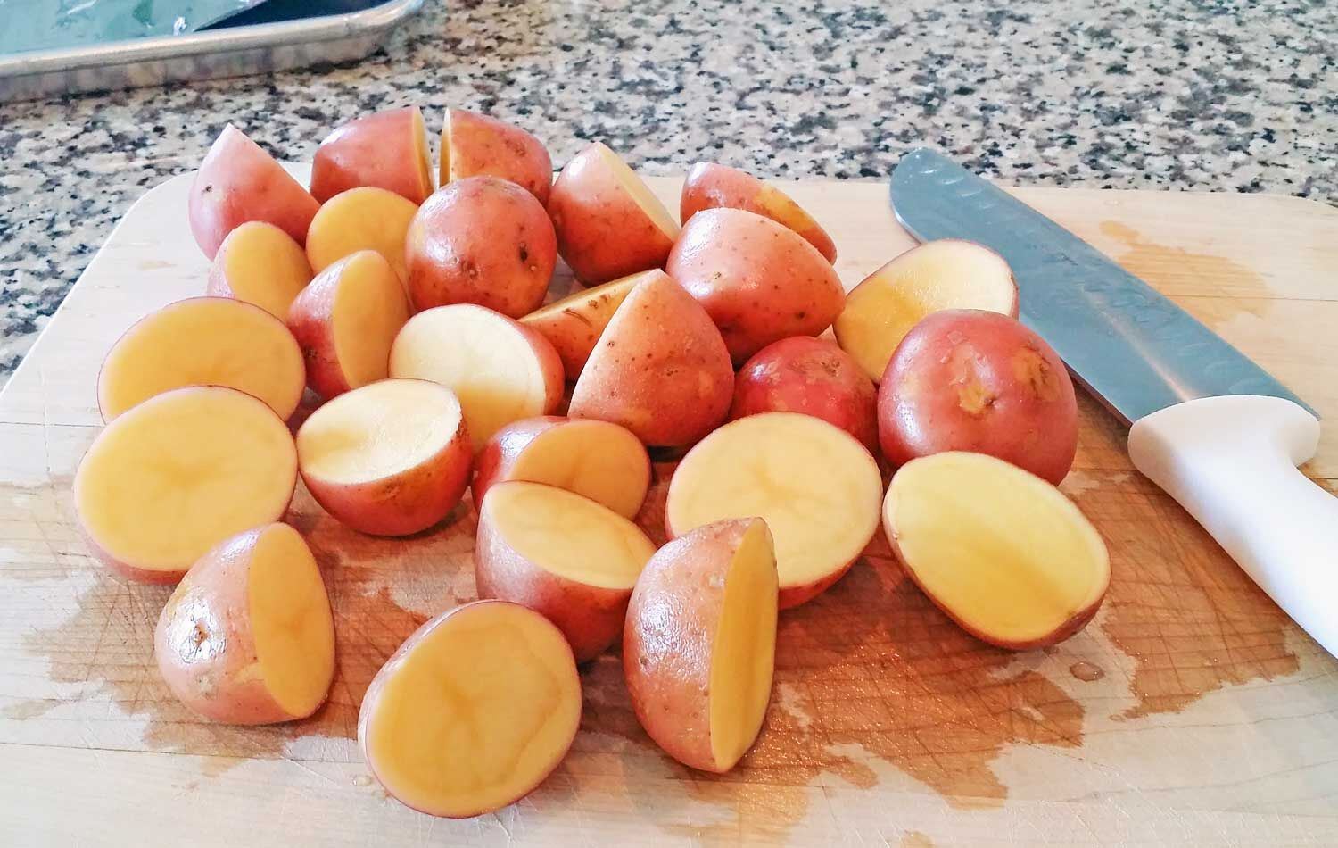 Half or quarter the potatoes before roasting