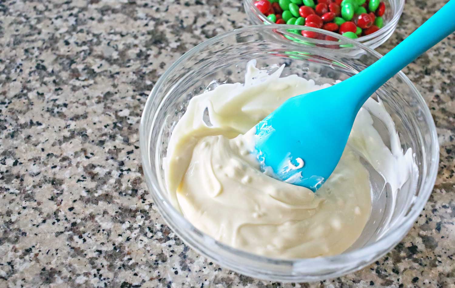 Melt the white chocolate chips in a small bowl and stir until smooth.