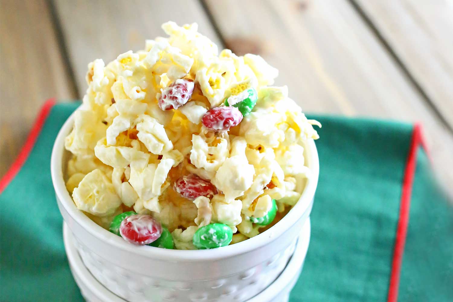Scoop the white chocolate popcorn into serving containers.