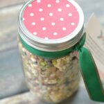 Looking for a thoughtful food gift alternative that doesn't require hours in the kitchen? This pretty 15 Bean Soup Jar is not only inexpensive to make, it literally comes together in minutes for a delicious homemade gift that is sure to be appreciated.