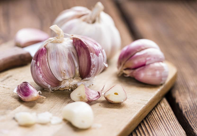 Garlic is a natural home remedy that works wonders for flus, colds and sore throats.