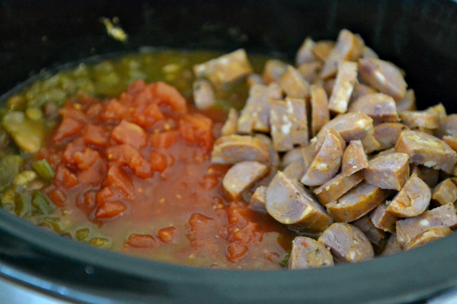 Add the tomatoes and sausage to the crock pot on cooking day. 