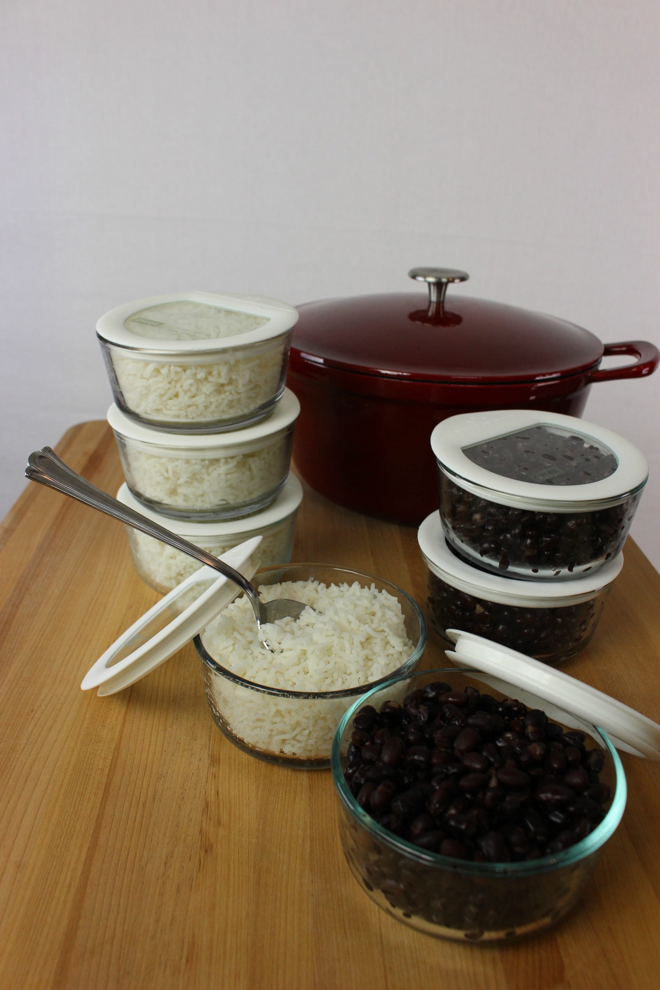 Batch cook your sides and starches ahead so weeknight dinners become super fast and easy. Store items like beans and rice in glass containers for easy access. 