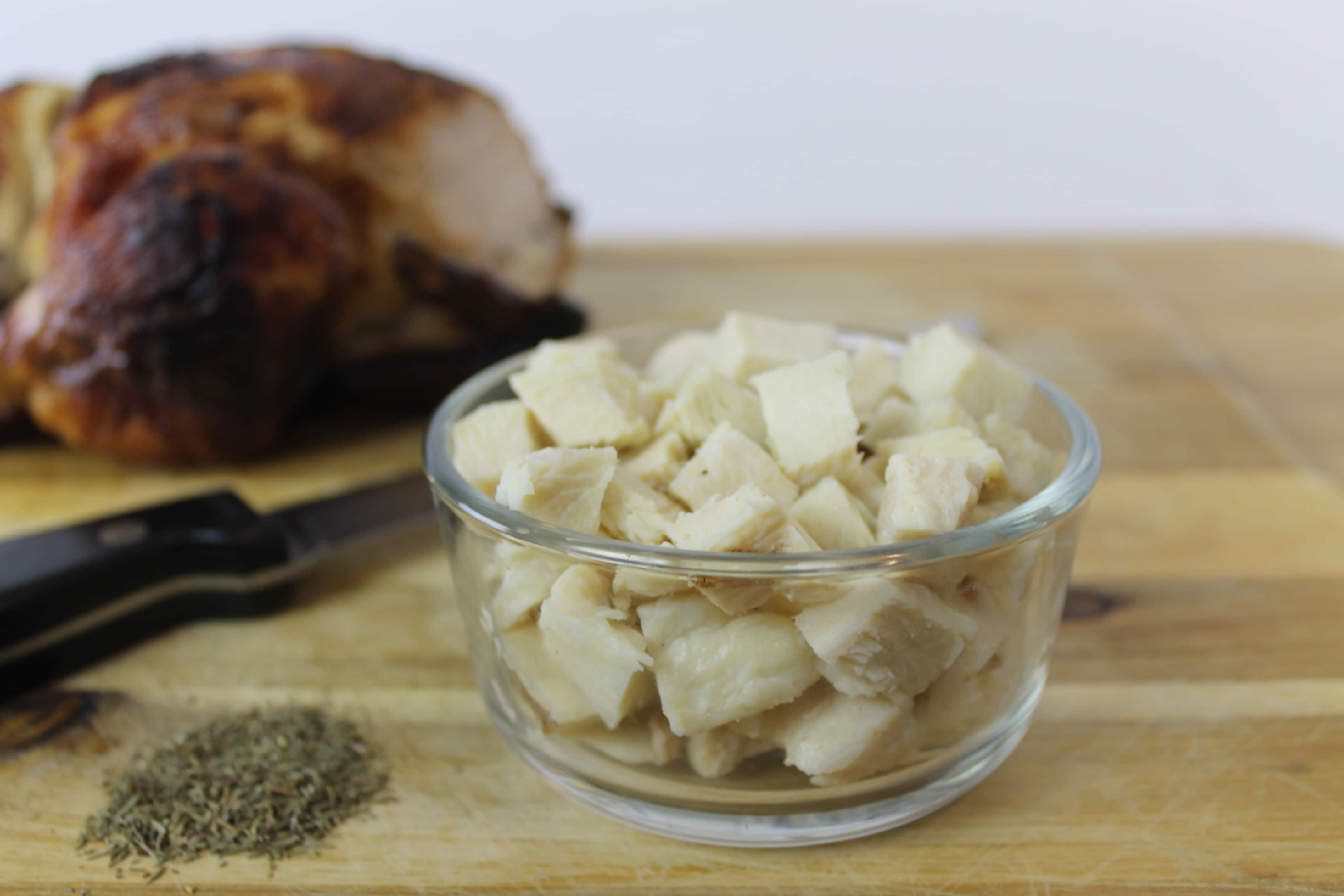 Roast a whole chicken and then dice into bit-sized chunks to store in glass containers for later use. 