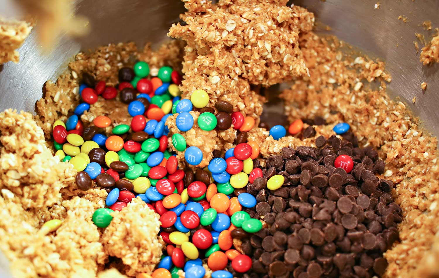 No-bake M&M cookie balls with chocolate chips and oatmeal. 