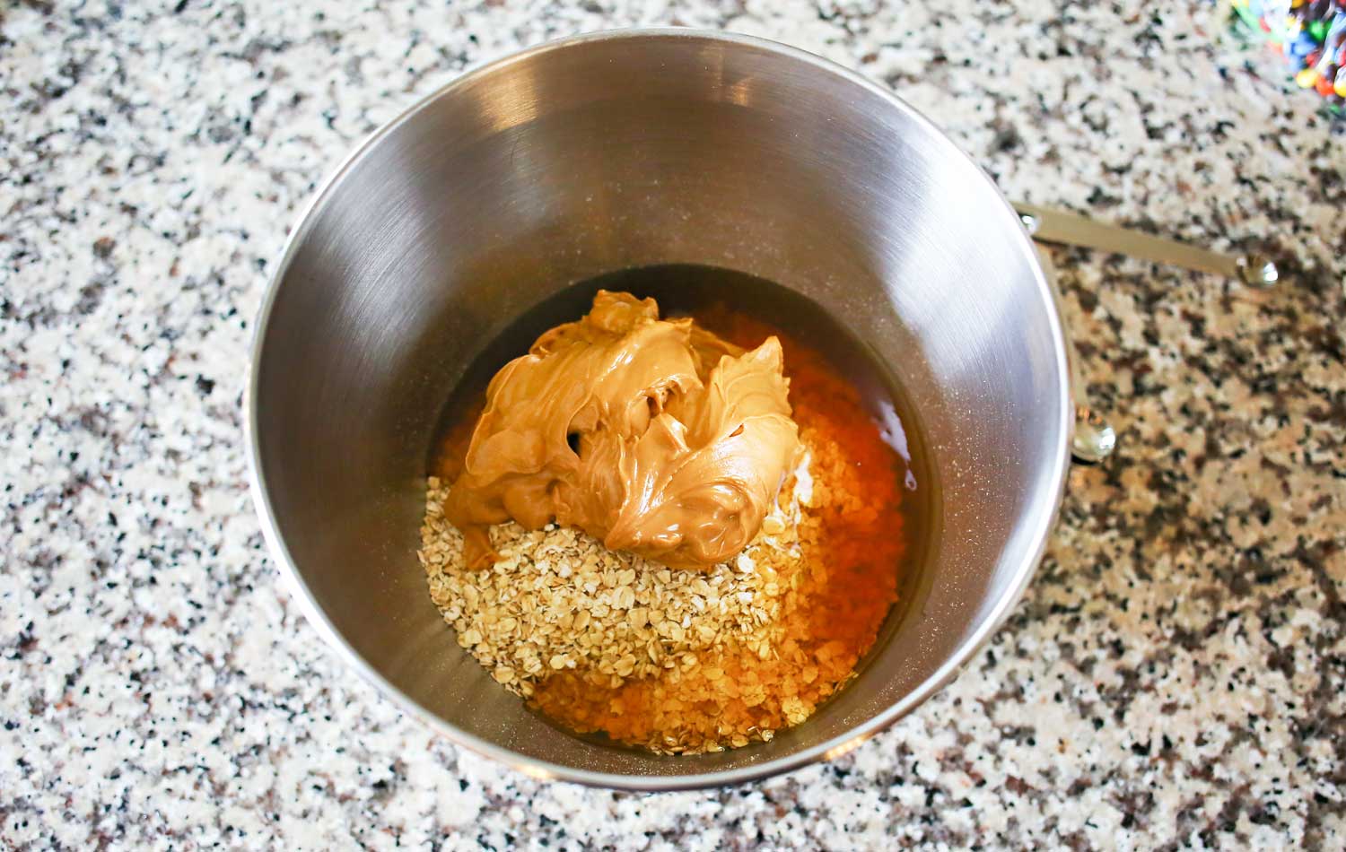 Combine the peanut butter, oats and vanilla in a mixing bowl. 