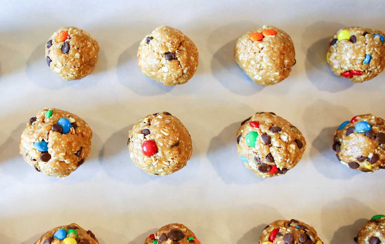 Scoop teaspoons of the cookie dough and roll into balls.