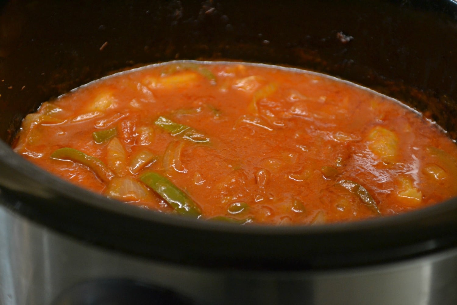 Heat the sausage, peppers and onions in the slow cooker when you're ready to enjoy. 